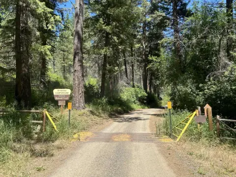 Brownlee Campground entrance road and sign.
