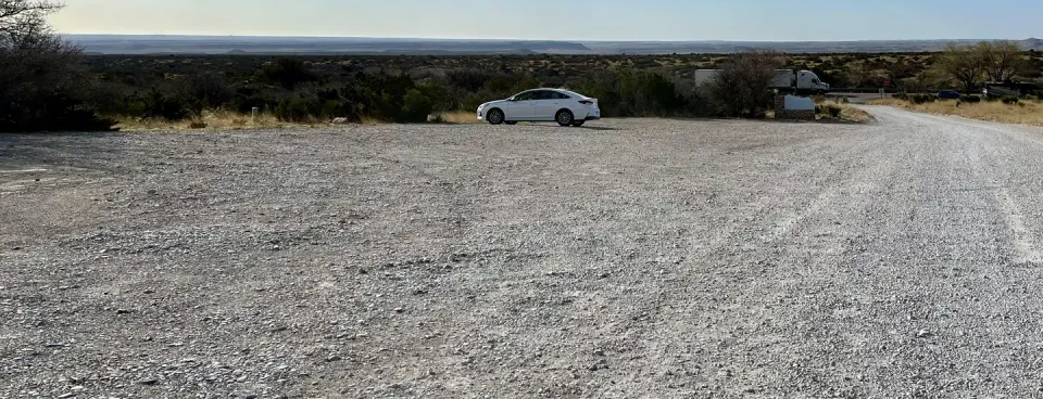 View of trailhead parking located next to the Frijole Horse Corral Campsite. This area is available for larger horse trailers too.