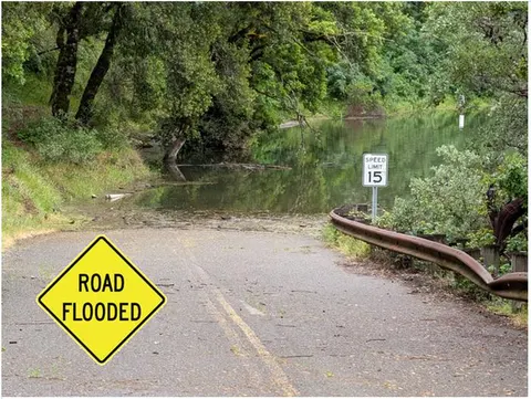 Road to Bushay flooded