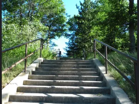 Looking up a flight of stairs from the Kneff Lake Day Use Area.